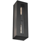 Chatham 2 Light Outdoor Wall Mount by Access Lighting features a rectangular black frame with a clear vertical glass window that showcases two exposed bulbs inside, displayed against a white background.
