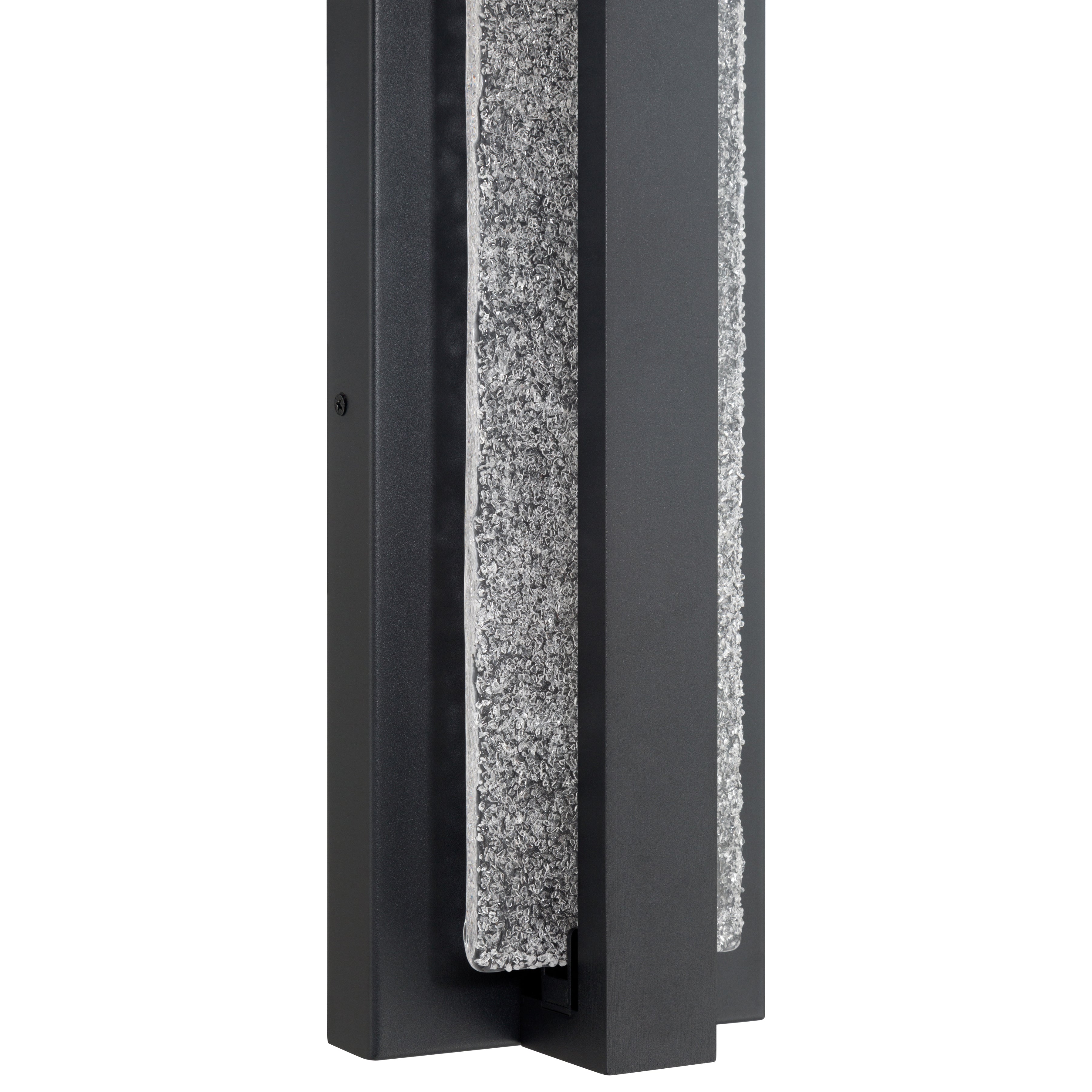 Close-up of the Access Lighting Riviera LED Outdoor Wall Mount, 24W—a modern rectangular black metal fixture featuring a vertically running, textured granite-like accent.