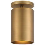 The Pint Indoor 1 Light Semi Flush by Access Lighting is a brushed brass cylindrical ceiling fixture with a flush mount base, displayed against a plain white background.
