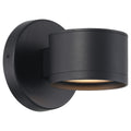 The Ari Bare Outdoor LED Wall Mount by Access Lighting is a black, cylindrical wall sconce with a round base that mounts on the wall and emits light downward from the bottom of the fixture.