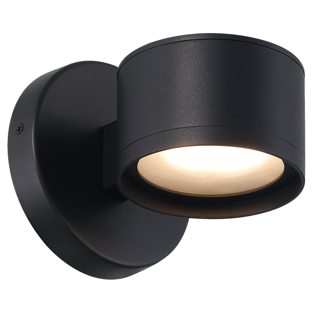 Ari Bare Outdoor LED Wall Mount by Access Lighting in a modern black cylindrical design with a round base, casts a bright, downward-facing glow against a plain white background.