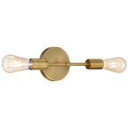 The Iconic 2 Light LED Wall Sconce by Access Lighting, featuring an antique brushed brass finish and two exposed bulbs, is mounted horizontally on a circular base against a white background.
