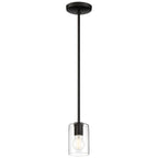 The Oslo LED Pendant by Access Lighting features a clear glass cylindrical shade suspended from a ceiling mount on a straight rod, showcasing a visible light bulb.