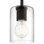 Introducing the Oslo LED Pendant by Access Lighting—a clear glass pendant light fixture featuring a visible LED filament bulb, suspended from a sleek black metal rod.