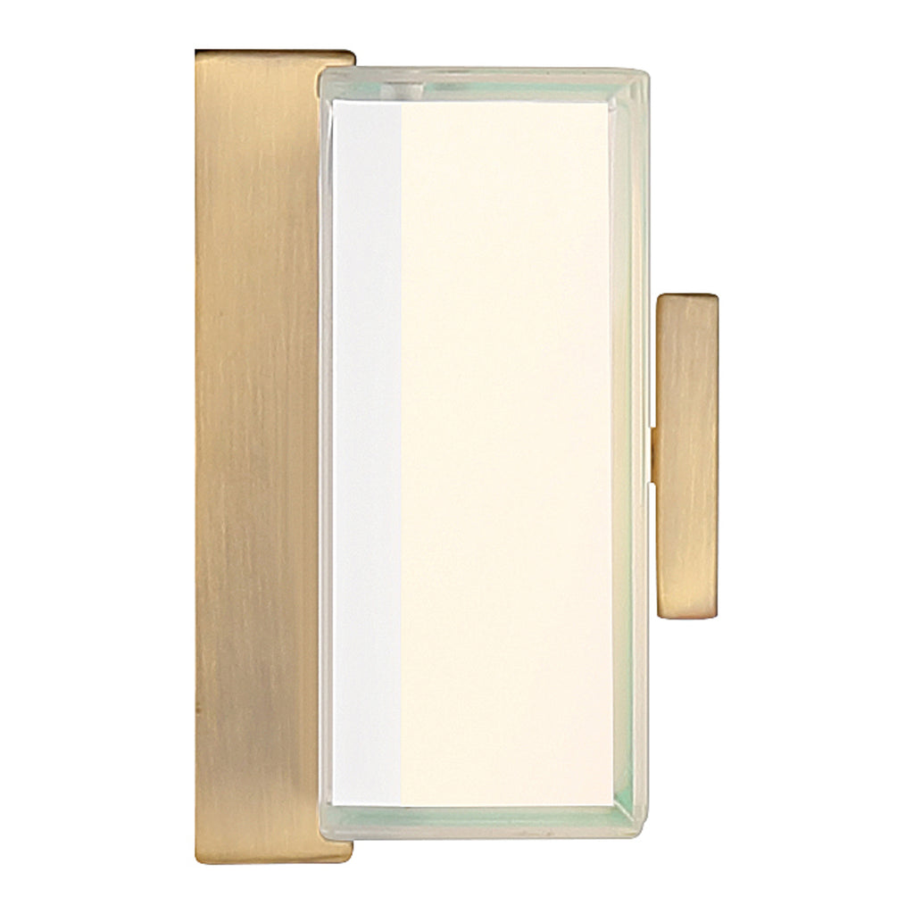 Restore LED Vanity by Access Lighting, featuring an Antique Brushed Brass finish and a frosted glass center, mounted vertically against a plain background.