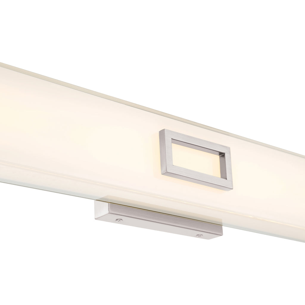 Restore LED Vanity by Access Lighting features a rectangular modern design with a frosted white cover and a small brushed steel geometric accent at the center.