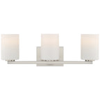The Sienna 3 Light Vanity by Access Lighting features frosted glass cylindrical shades and a brushed steel rectangular base, shown illuminated.