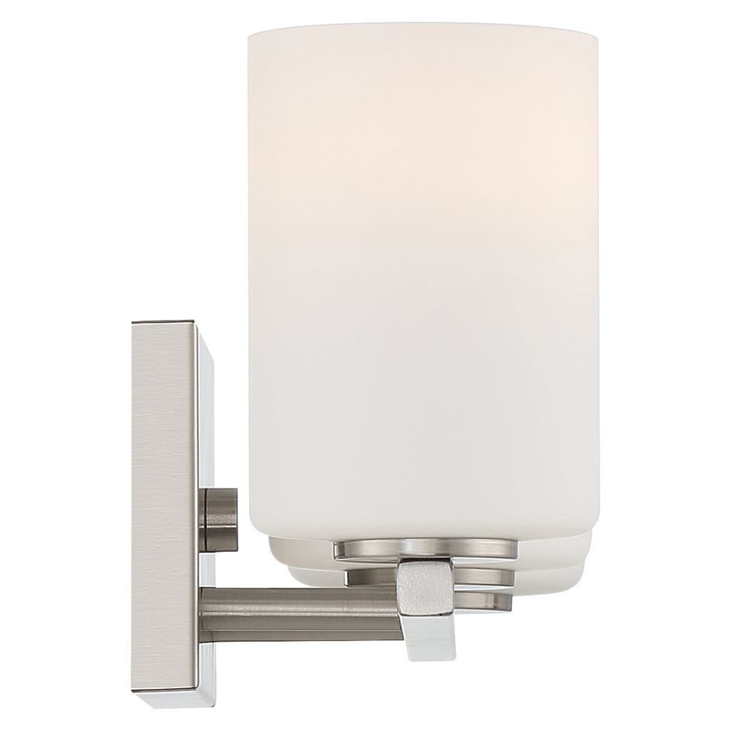 The Sienna 3 Light Vanity by Access Lighting features a brushed steel rectangular base and cylindrical frosted glass shades in a wall-mounted design.