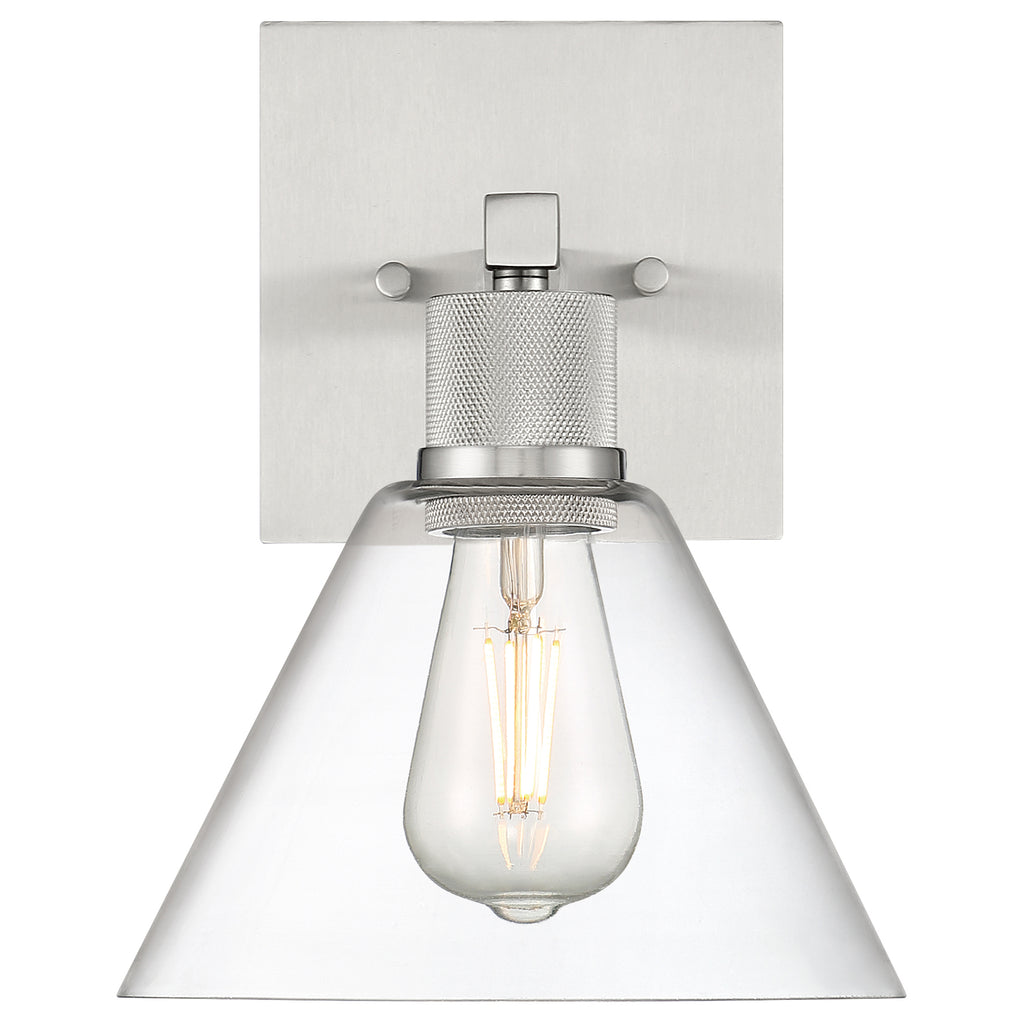 The Port Nine Martini LED Wall Sconce by Access Lighting features a brushed steel base, a clear glass conical shade, and an exposed Edison-style light bulb (7W).