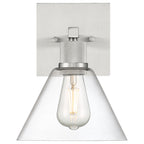 The Port Nine Martini LED Wall Sconce by Access Lighting features a brushed steel base, a clear glass conical shade, and an exposed Edison-style light bulb (7W).