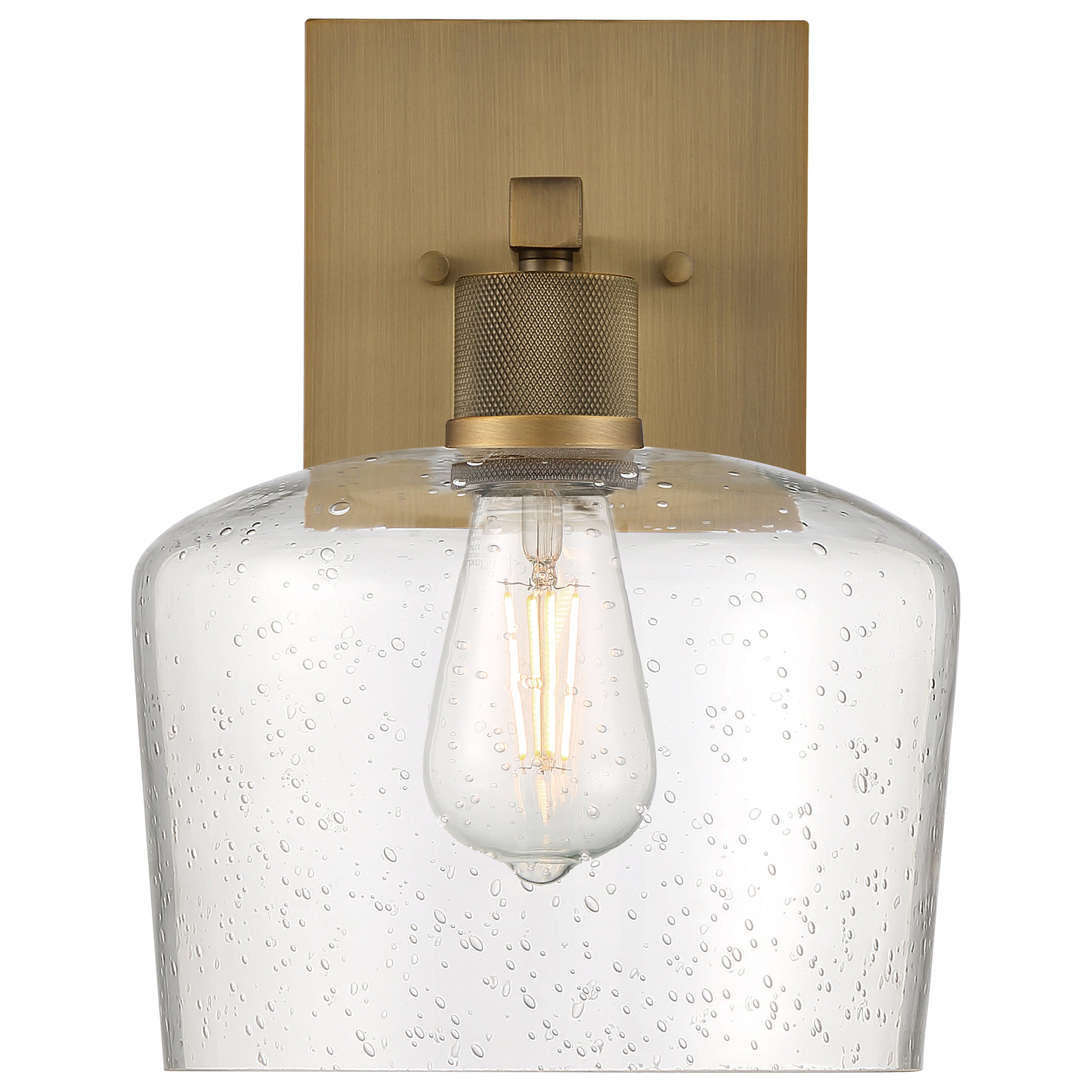 Port Nine Chardonnay LED Wall Sconce by Access Lighting features an antique brushed brass backplate, a clear seeded glass shade, and a 7W LED that evokes the look of a vintage-style filament bulb.