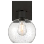 The Access Lighting Port Nine Burgundy LED Wall Sconce features a matte black square base, a seeded (bubbled) glass globe, and an exposed filament-style bulb inside.