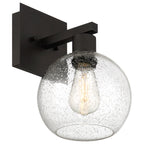 The Port Nine Burgundy LED Wall Sconce by Access Lighting features a matte black metal base and a seeded glass globe shade, highlighting the visible vintage-style LED bulb inside.