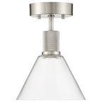 The Access Lighting Port Nine Martini LED Semi-Flush features a brushed steel finish, a textured cylindrical detail, and a clear glass cone-shaped shade.