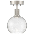 The Port Nine Burgundy LED Semi-Flush by Access Lighting features brushed steel hardware and a seeded glass shade, offering modern style with a 9W integrated LED.