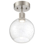 The Access Lighting Port Nine Burgundy LED Semi-Flush features a round, seeded glass shade and a brushed steel base.